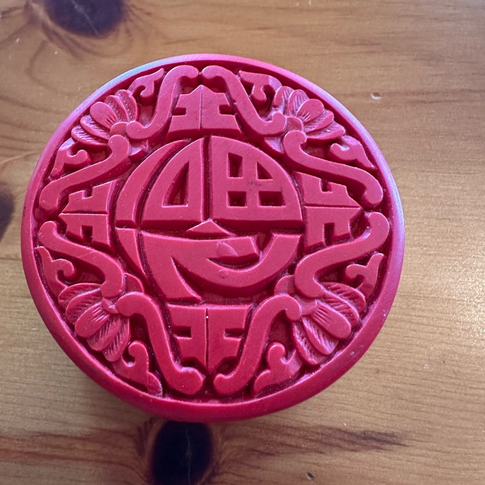 Carved cinnabar trinket box, preowned.